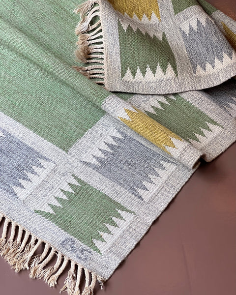 Vintage green/multi-coloured flat weave rug by Birgitta Södergren (BS)