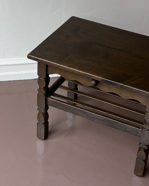 Vintage wooden side table with wavy/scalloped details