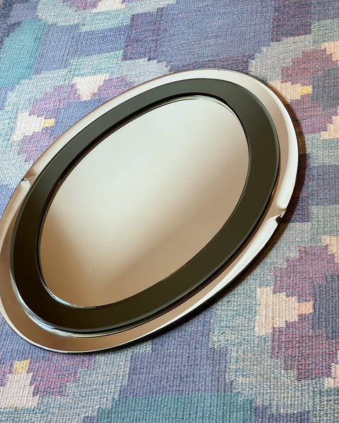 Vintage Italian mirror with faceted green mirror frame