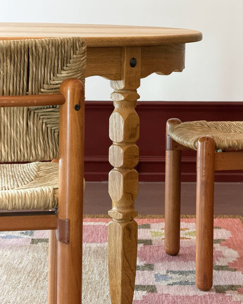 Vintage round wooden dining table with wavy/scalloped details