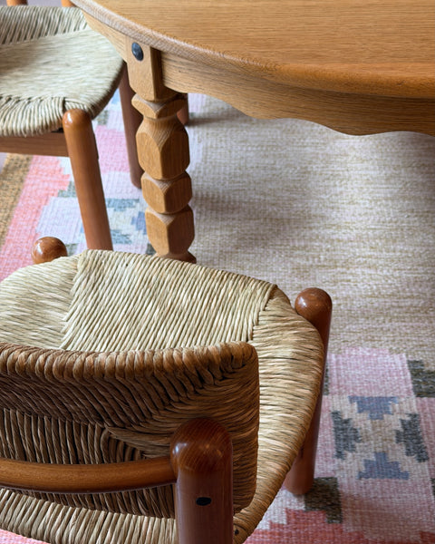 Vintage round wooden dining table with wavy/scalloped details