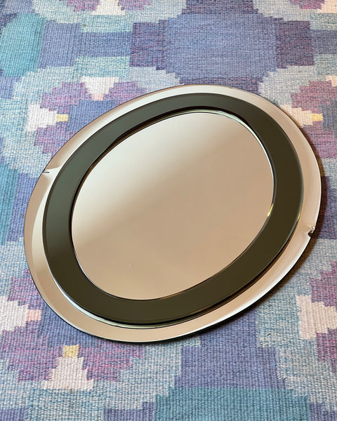 Vintage Italian mirror with faceted green mirror frame