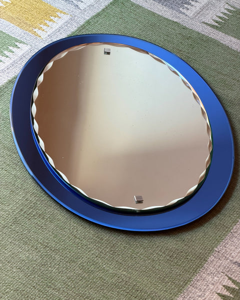 Vintage Italian mirror with faceted blue mirror frame