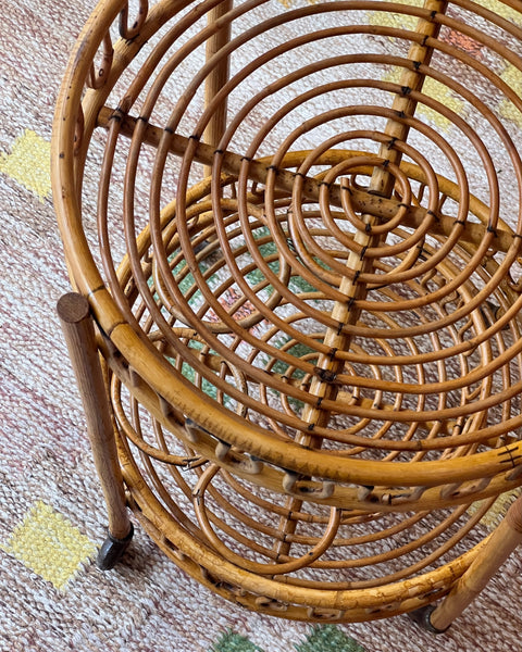Vintage rattan table with wheels