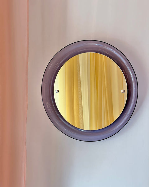 Round vintage Italian mirror with purple plastic frame