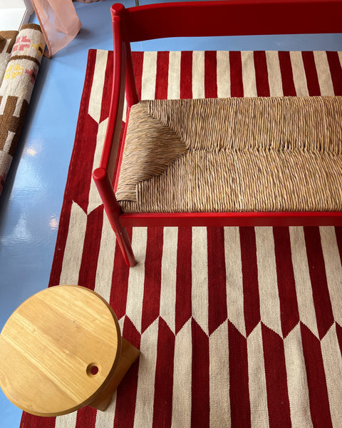 Carimate red bench by Vico Magistretti