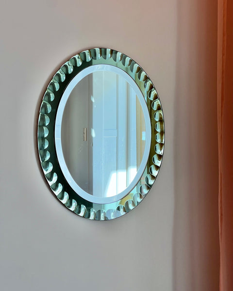 Vintage Italian mirror with green faceted mirror frame