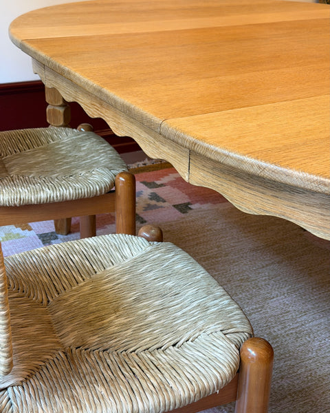 Vintage round wooden dining table with wavy/scalloped details