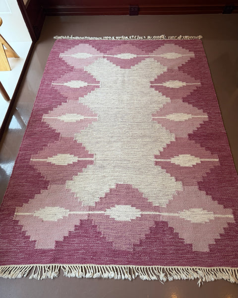 Vintage pink/purple flat weave rug