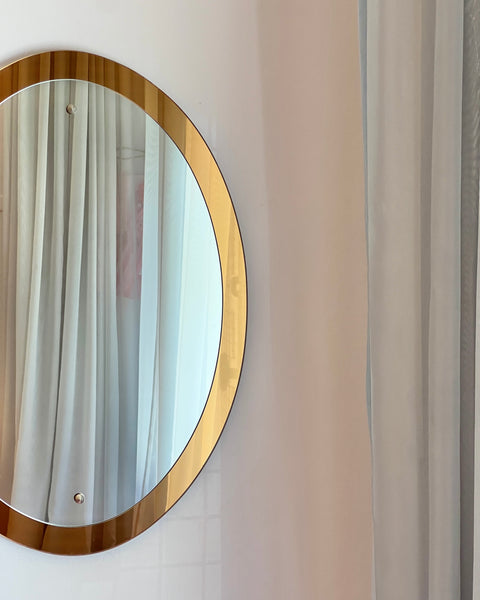 Vintage oval golden Italian mirror