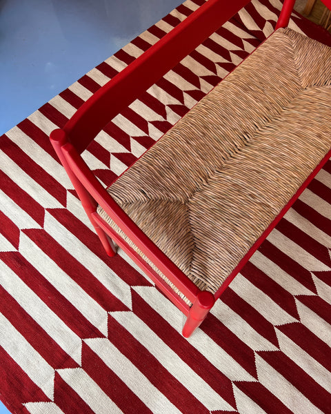 Carimate red bench by Vico Magistretti