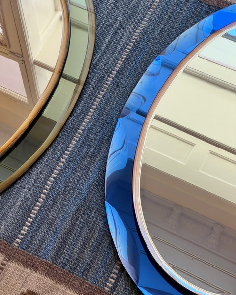 Vintage Italian mirror with blue faceted mirror frame