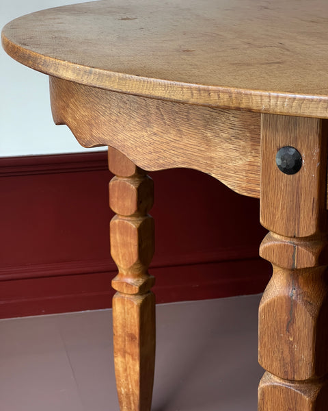 Vintage round wooden dining table with wavy/scalloped details