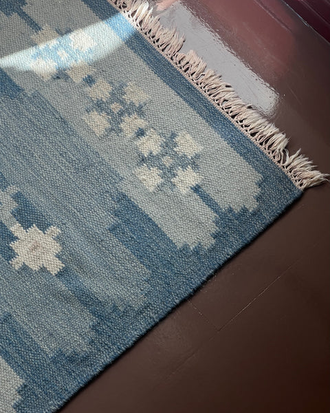 Vintage blue flat weave rug