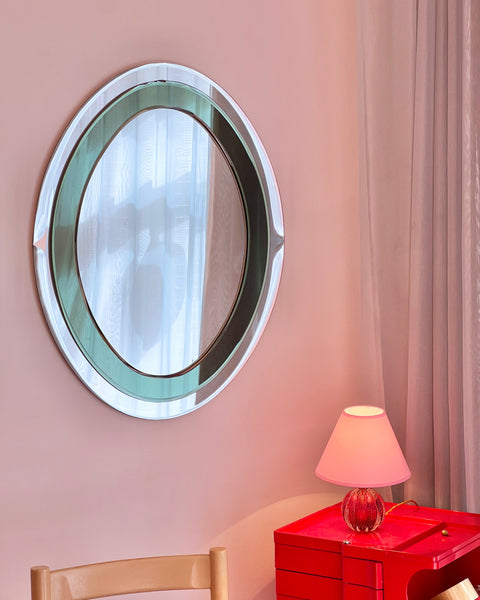 Vintage oval Italian mirror with green and facetted mirror frame