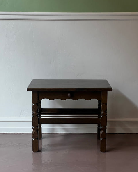 Vintage wooden side table with wavy/scalloped details