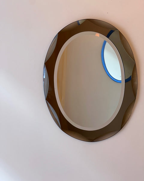 Vintage Italian mirror with golden brown faceted mirror frame