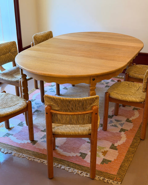 Vintage round wooden dining table with wavy/scalloped details