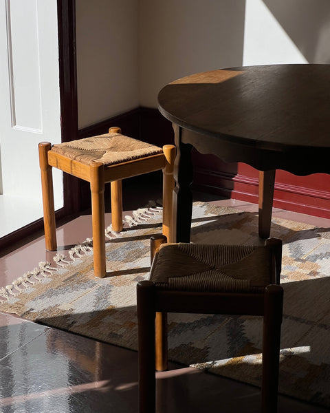Vintage round wooden dining table with wavy/scalloped details