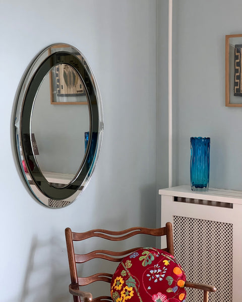 Vintage oval Italian mirror with green and facetted mirror frame