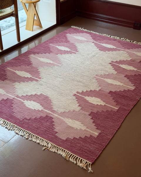 Vintage pink/purple flat weave rug