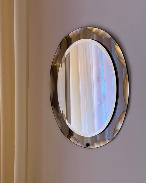 Vintage Italian mirror with golden brown faceted mirror frame