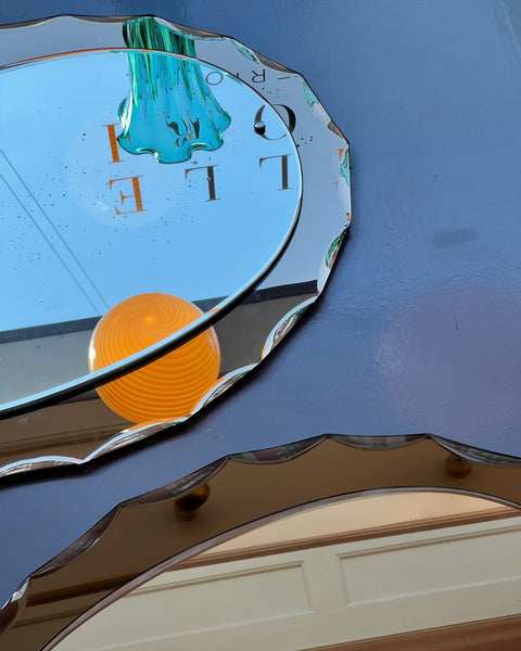 Vintage Italian mirror with brown facetted frame