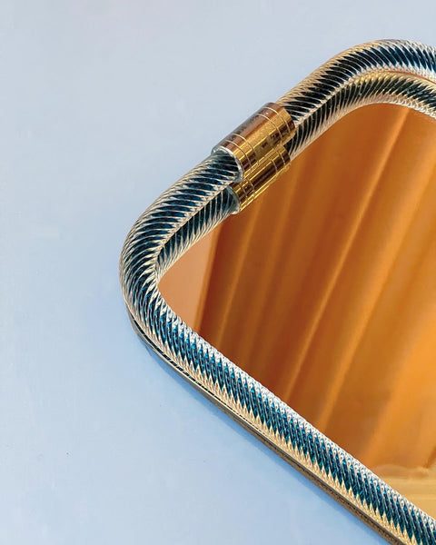 Vintage Italian mirror with twisted blue glass frame