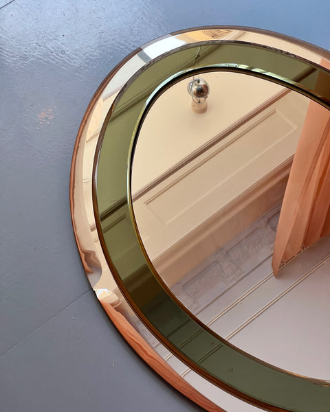 Vintage oval Italian mirror with green and facetted mirror frame