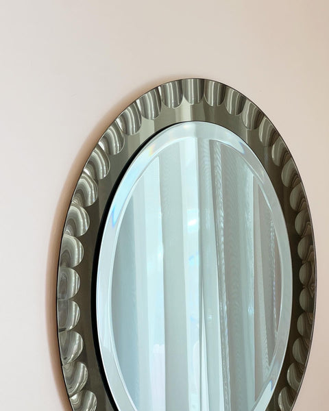 Vintage Italian mirror with golden brown faceted mirror frame