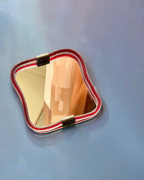 Vintage Italian mirror with red twisted clear glass frame