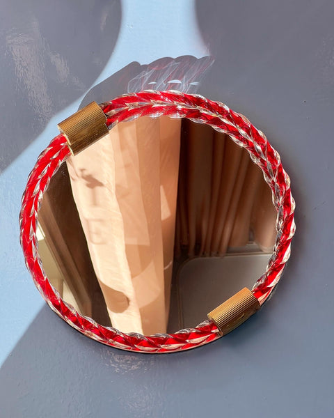 Vintage Italian mirror with twisted red glass frame