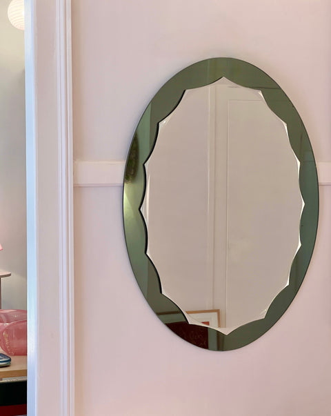 Vintage Italian mirror with oval green scalloped frame