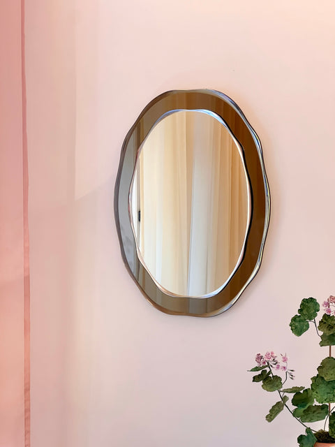 Vintage Italian mirror with wavy golden brown frame