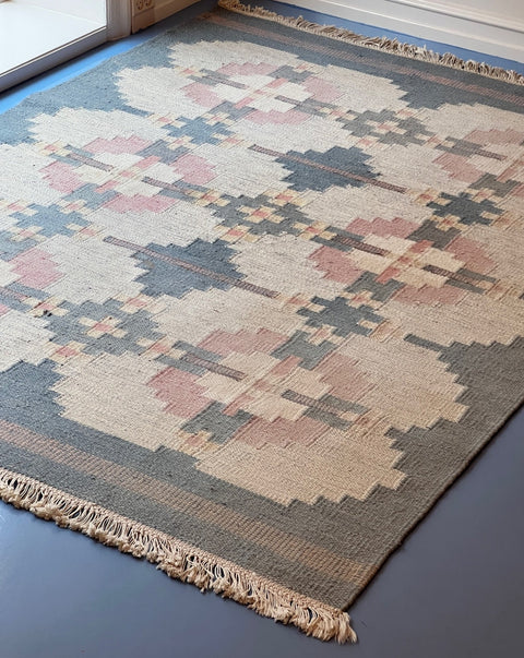 Vintage light blue flat weave rug signed HLO