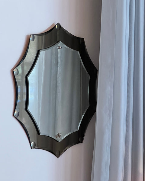 Vintage Italian mirror with golden brown faceted mirror frame