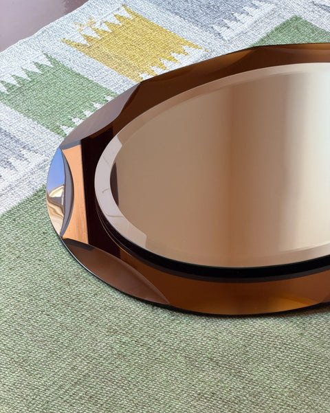 Vintage Italian mirror with golden brown / yellow faceted mirror frame