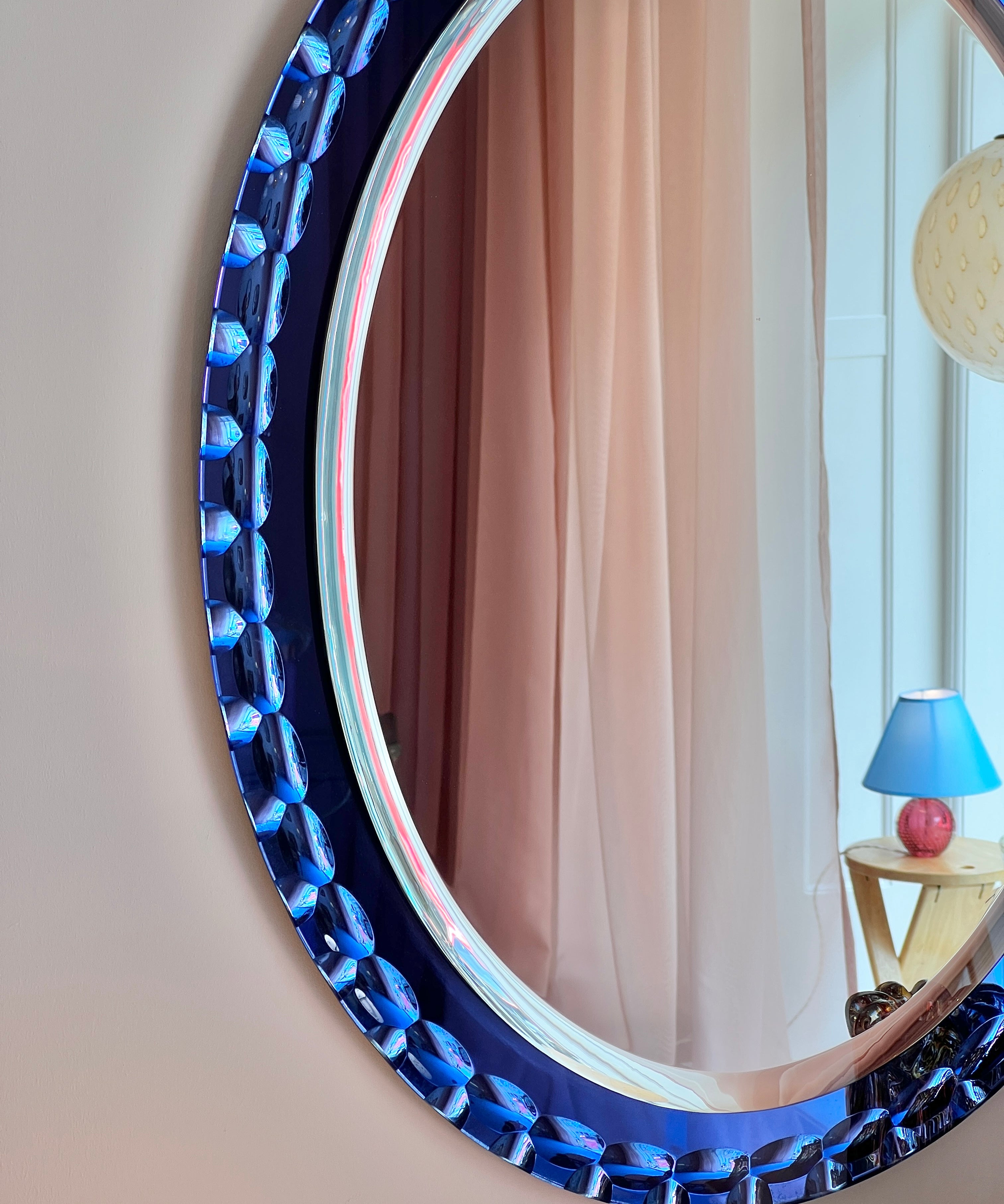 Vintage Italian mirror with blue faceted mirror frame