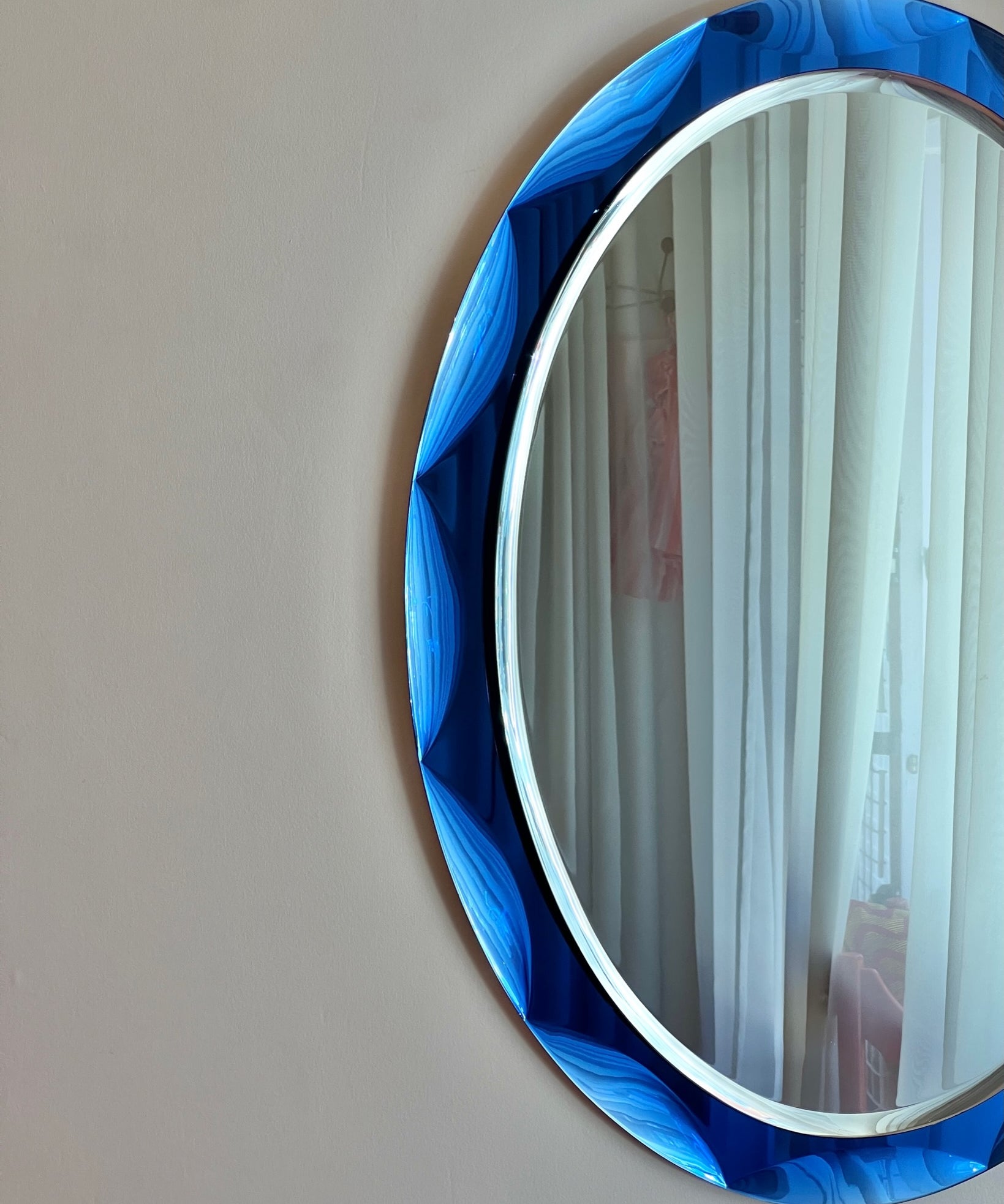 Vintage Italian mirror with blue faceted mirror frame