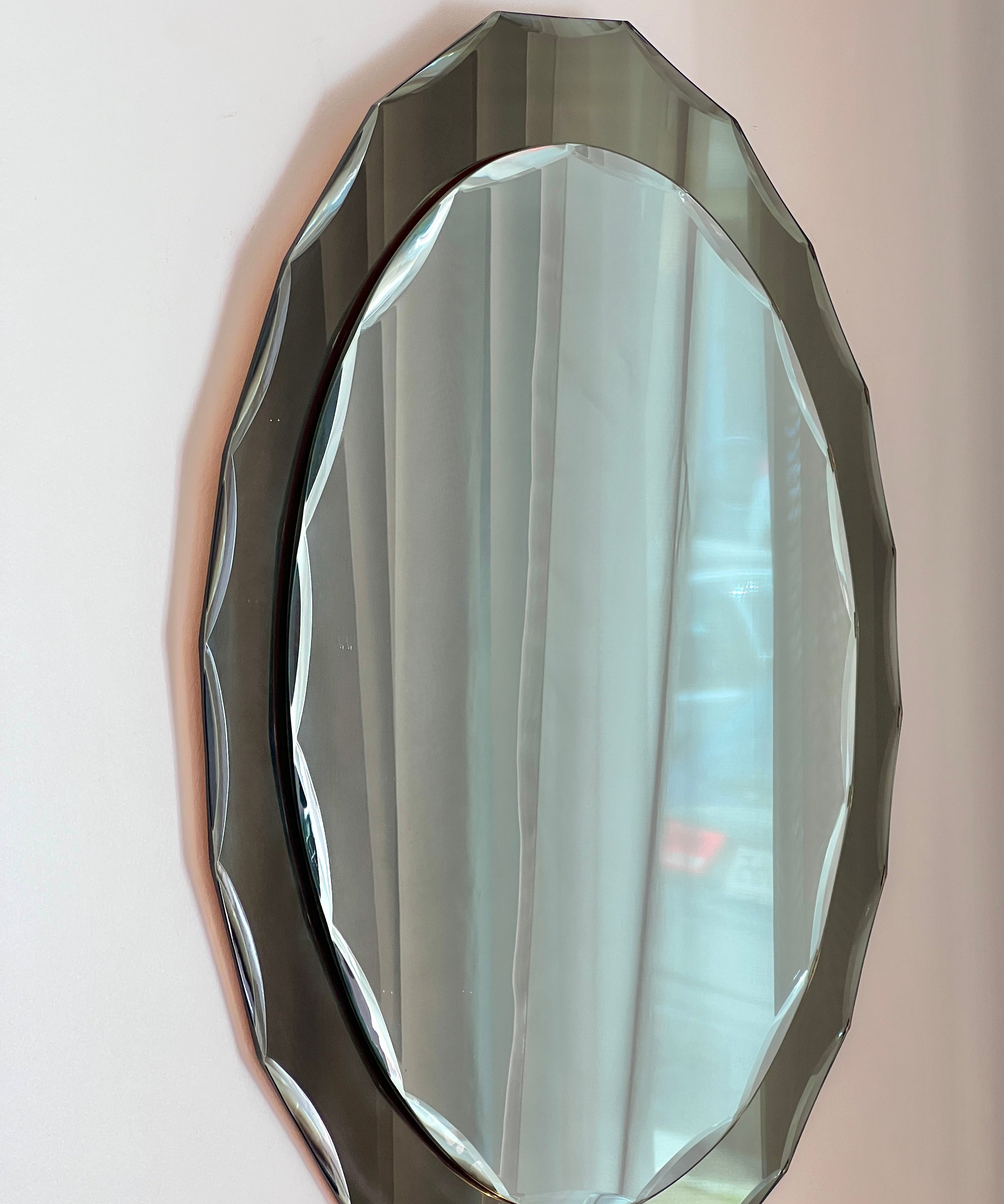 Vintage Italian mirror with golden brown faceted mirror frame