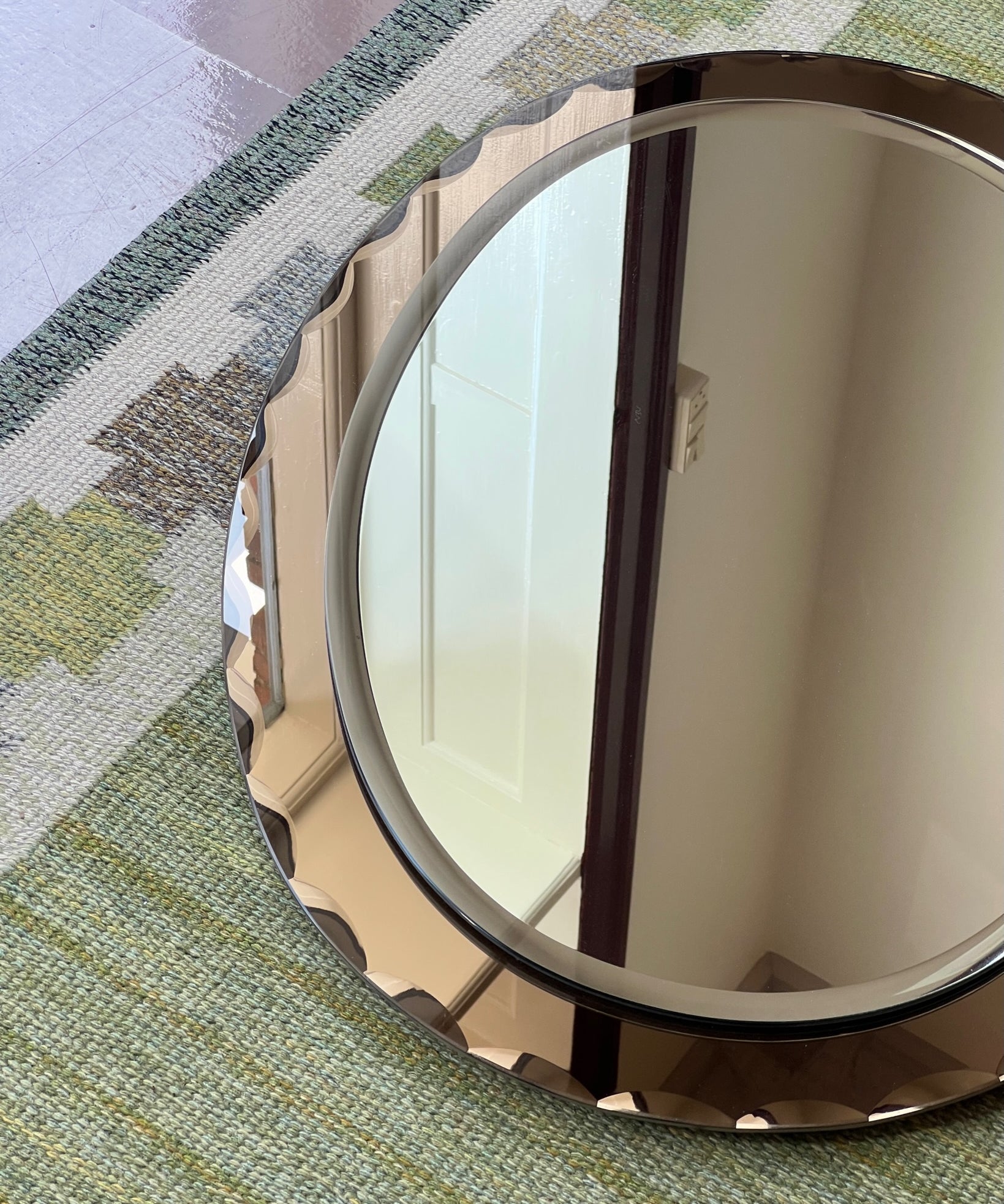 Vintage Italian mirror with golden brown faceted mirror frame