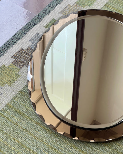 Vintage Italian mirror with golden brown faceted mirror frame