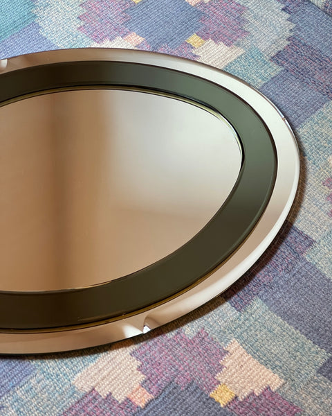 Vintage Italian mirror with faceted green mirror frame