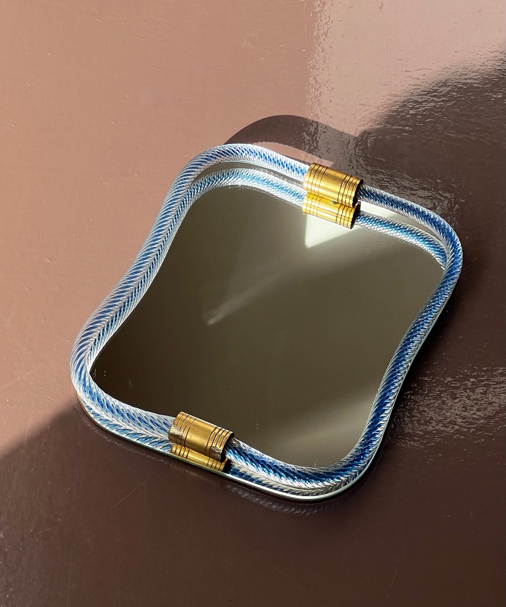 Vintage Italian mirror with twisted clear/blue glass frame