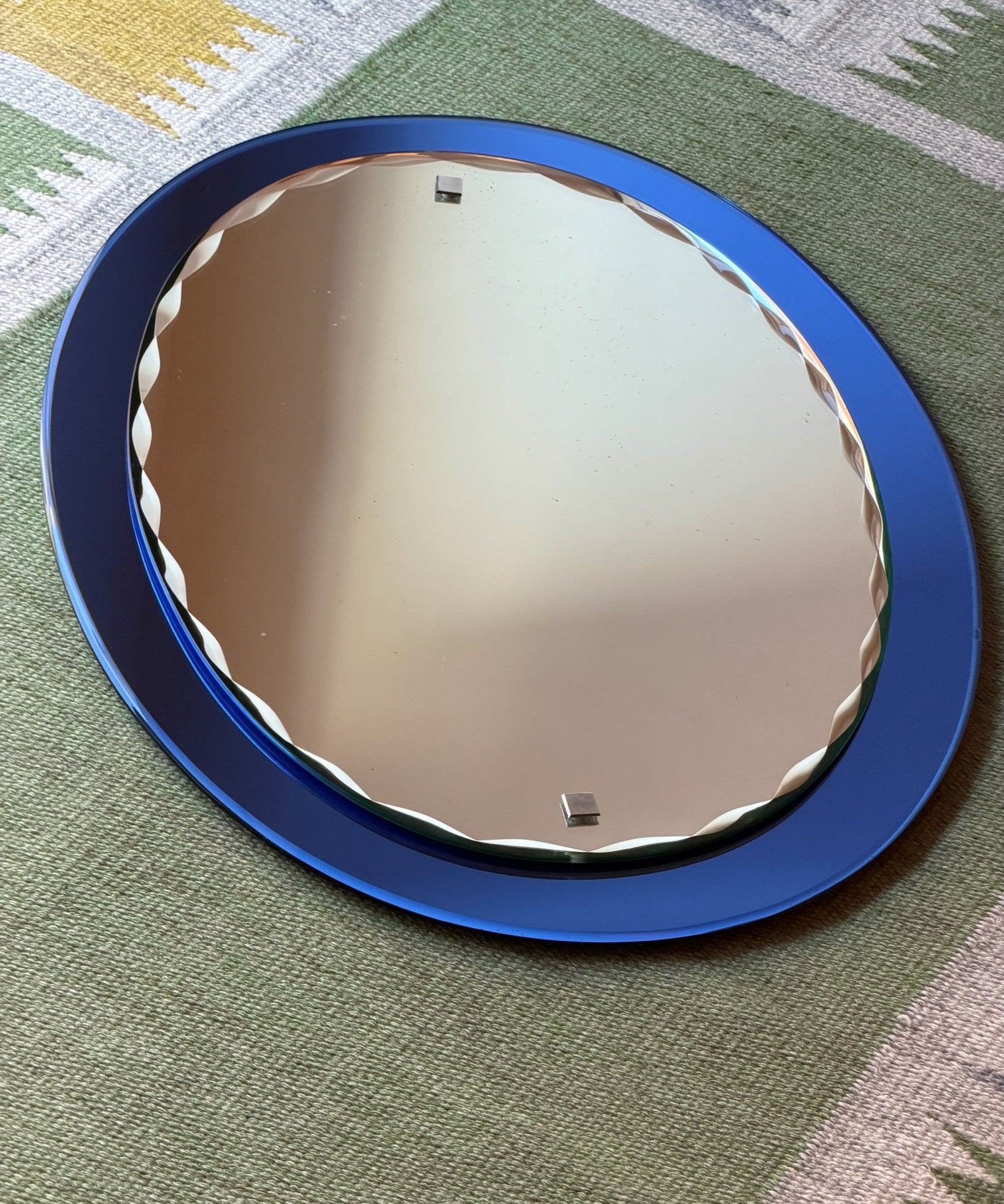 Vintage Italian mirror with faceted blue mirror frame