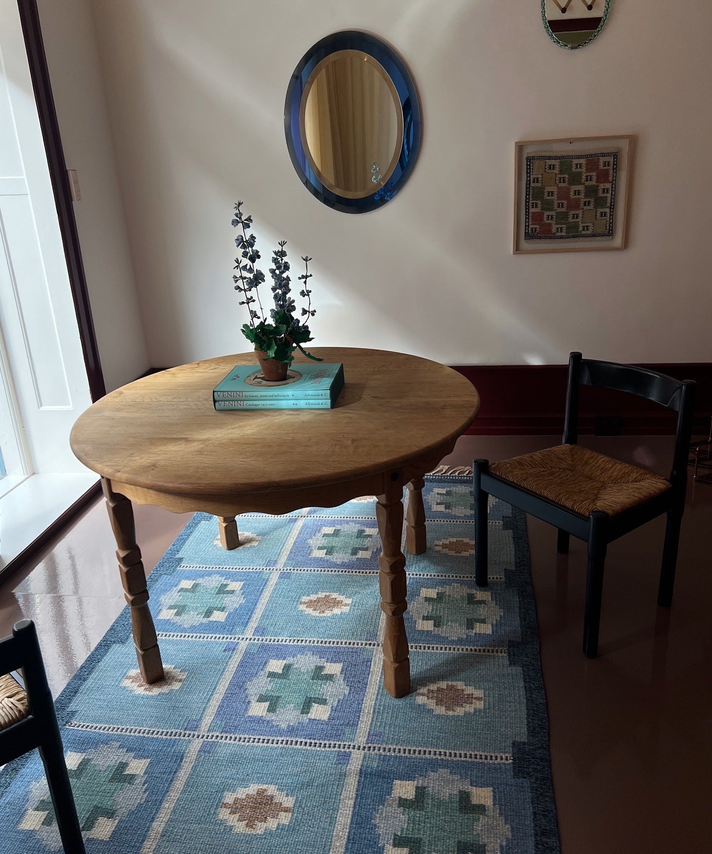 Vintage round wooden dining table with wavy/scalloped details