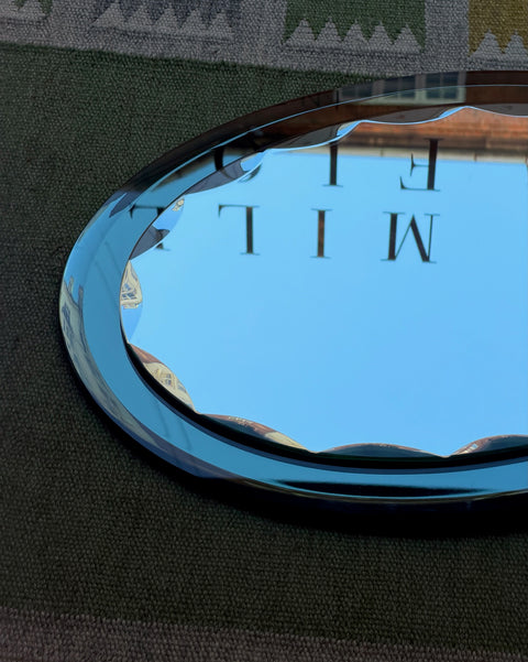 Vintage Italian mirror with faceted green mirror frame