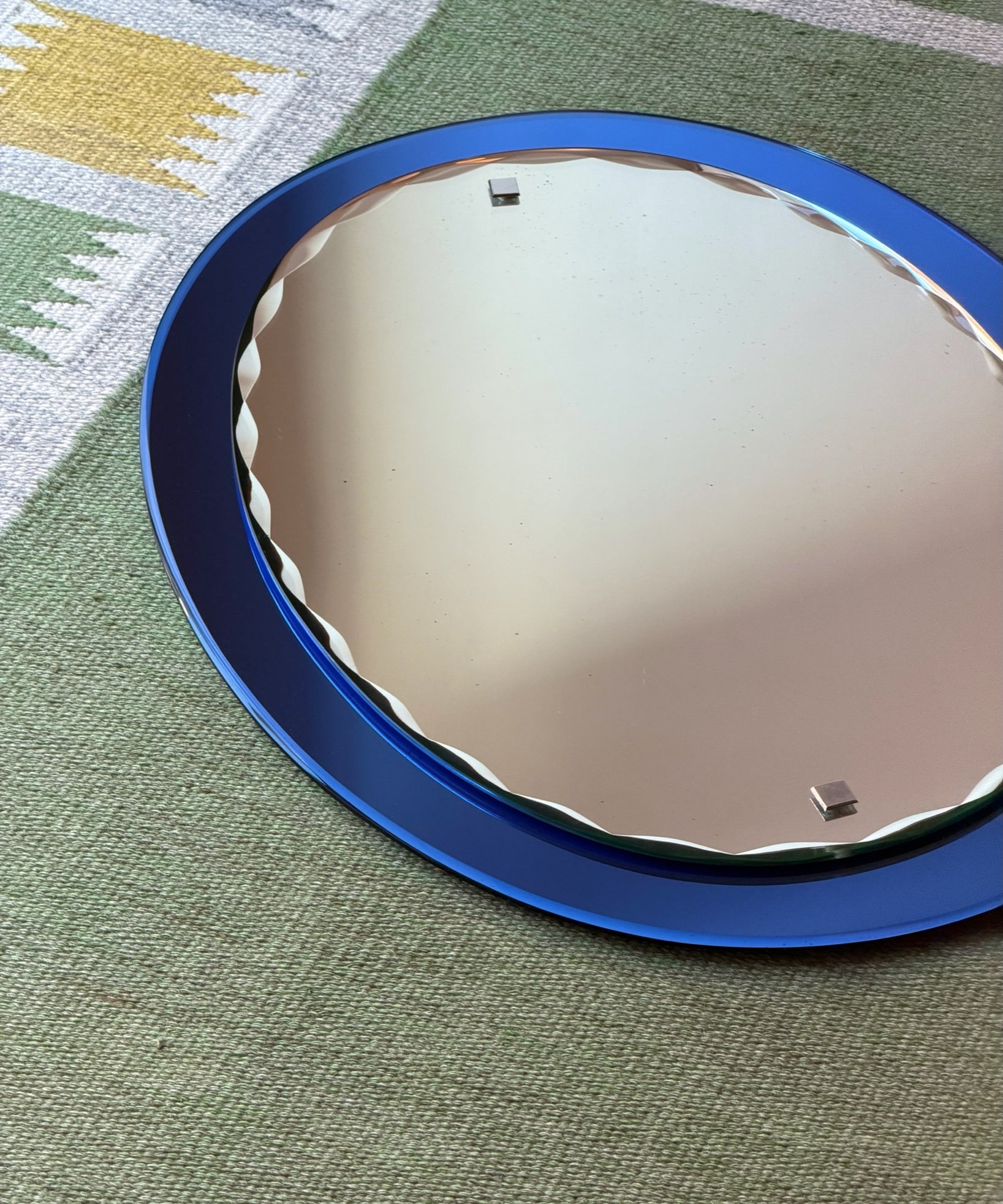 Vintage Italian mirror with faceted blue mirror frame