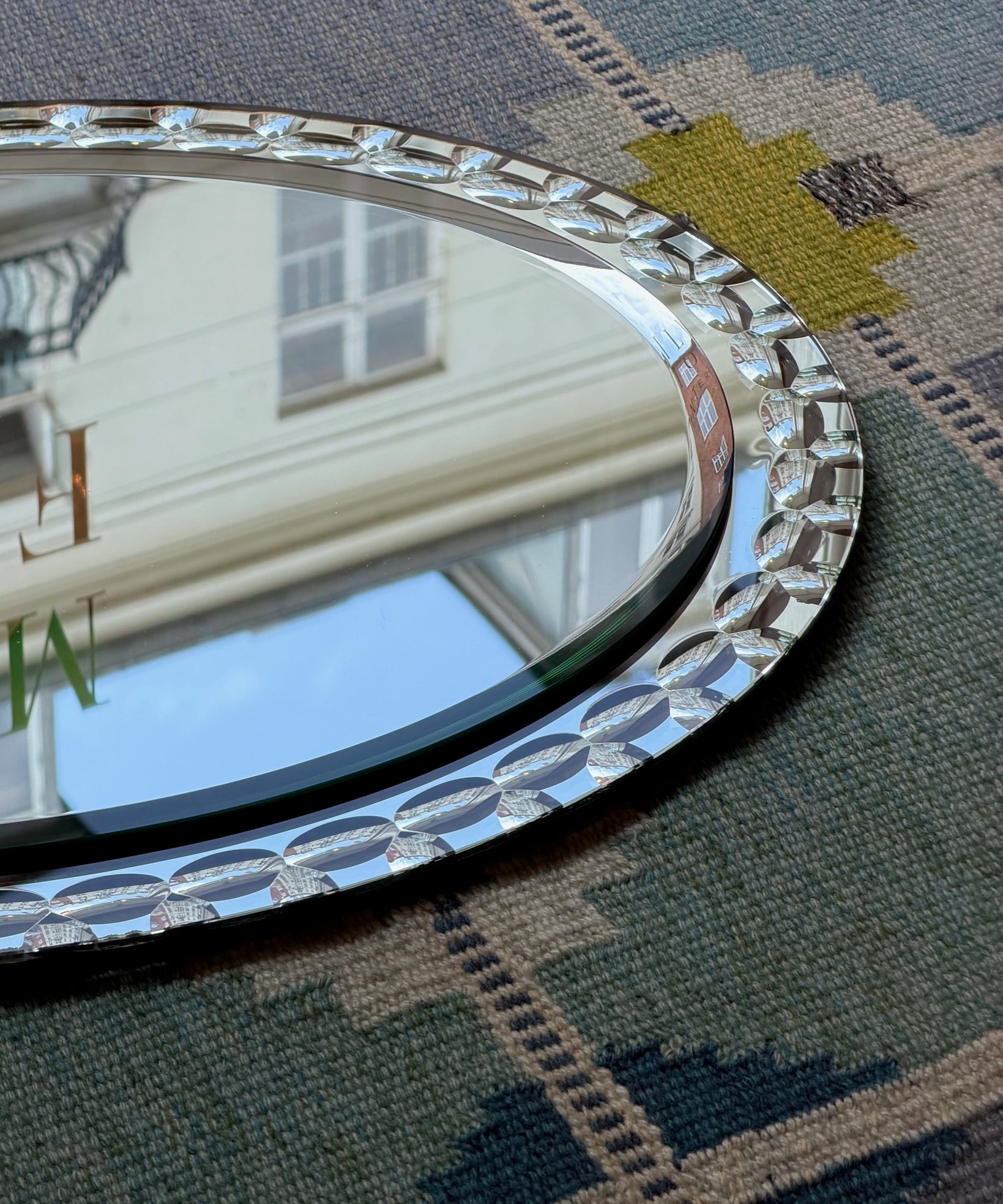 Vintage Italian mirror with faceted mirror frame