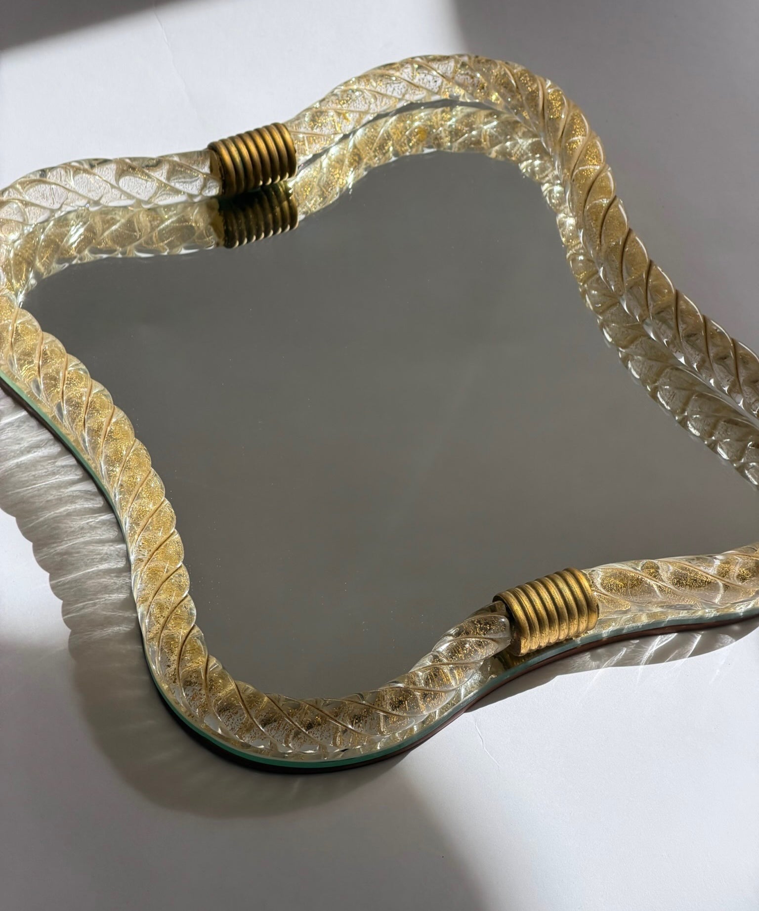 Vintage Italian mirror with twisted golden glass frame